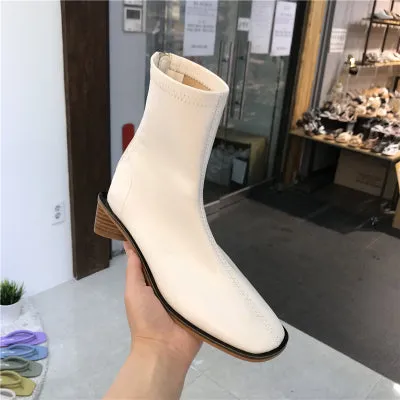 LUXE DESIGN ANKLE BOOTS WITH SHAPED LOW HEEL DETAIL